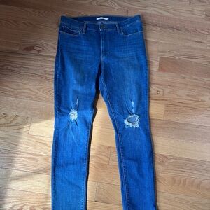 Women's Distressed Blue Skinny Jeans